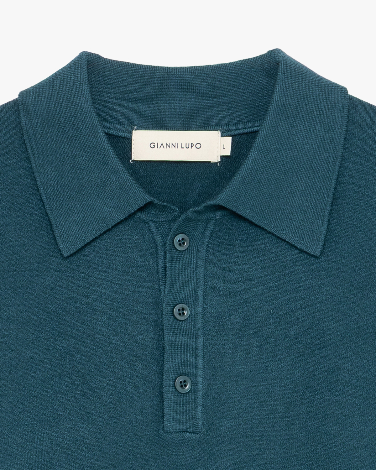 Polo in maglia – pavone